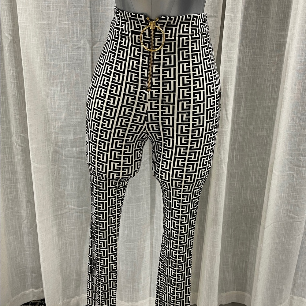 Balmain Monochrome Patterned pants with Gold Accent